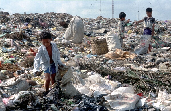 Children foraging in the garbage at Stung Mean Chey (Smokey Mountain), Phnom Penh
