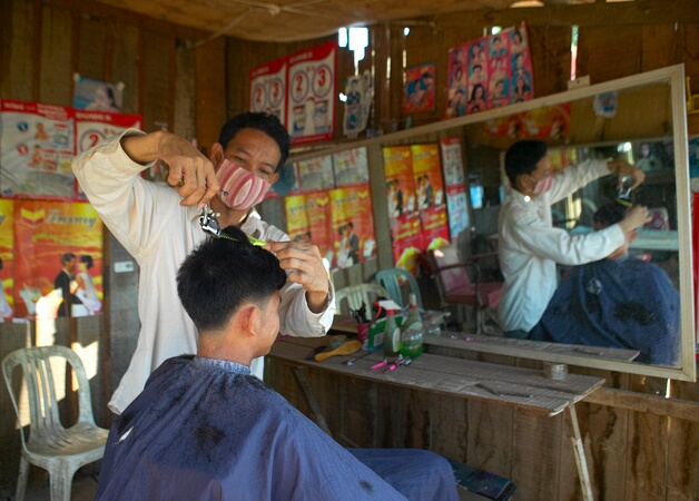 Road side barber near Phnom Penh, Cambodia