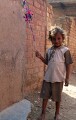 Child playing in an alley near the silk factory, Varanasi
