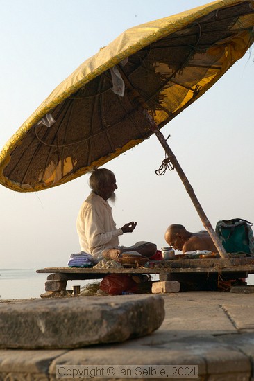 Priest offering blessings at Dashashwamedh Ghat, Varanasi