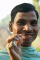 In the countryside near Varanasi: stick toothbrush
